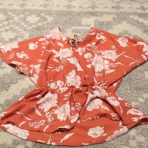 Orange Top with White Flowers